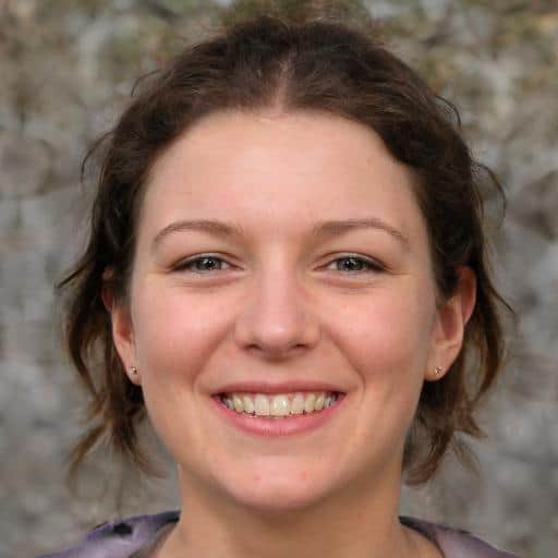 Smiling woman with curly hair outdoors