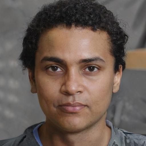 Portrait of a person with curly hair.